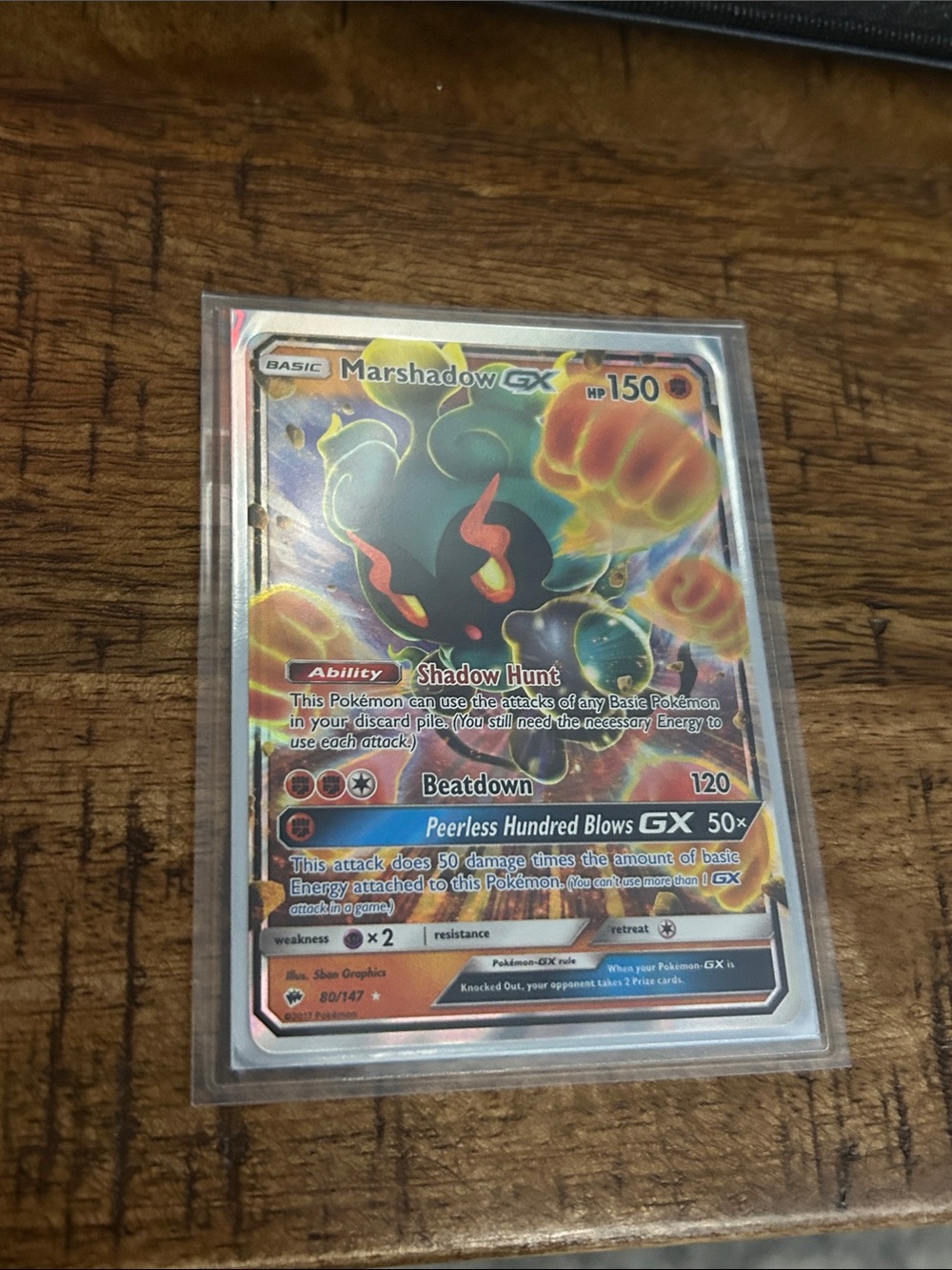 Pokemon Marshadow GX Holographic Card - Black, Green, Orange